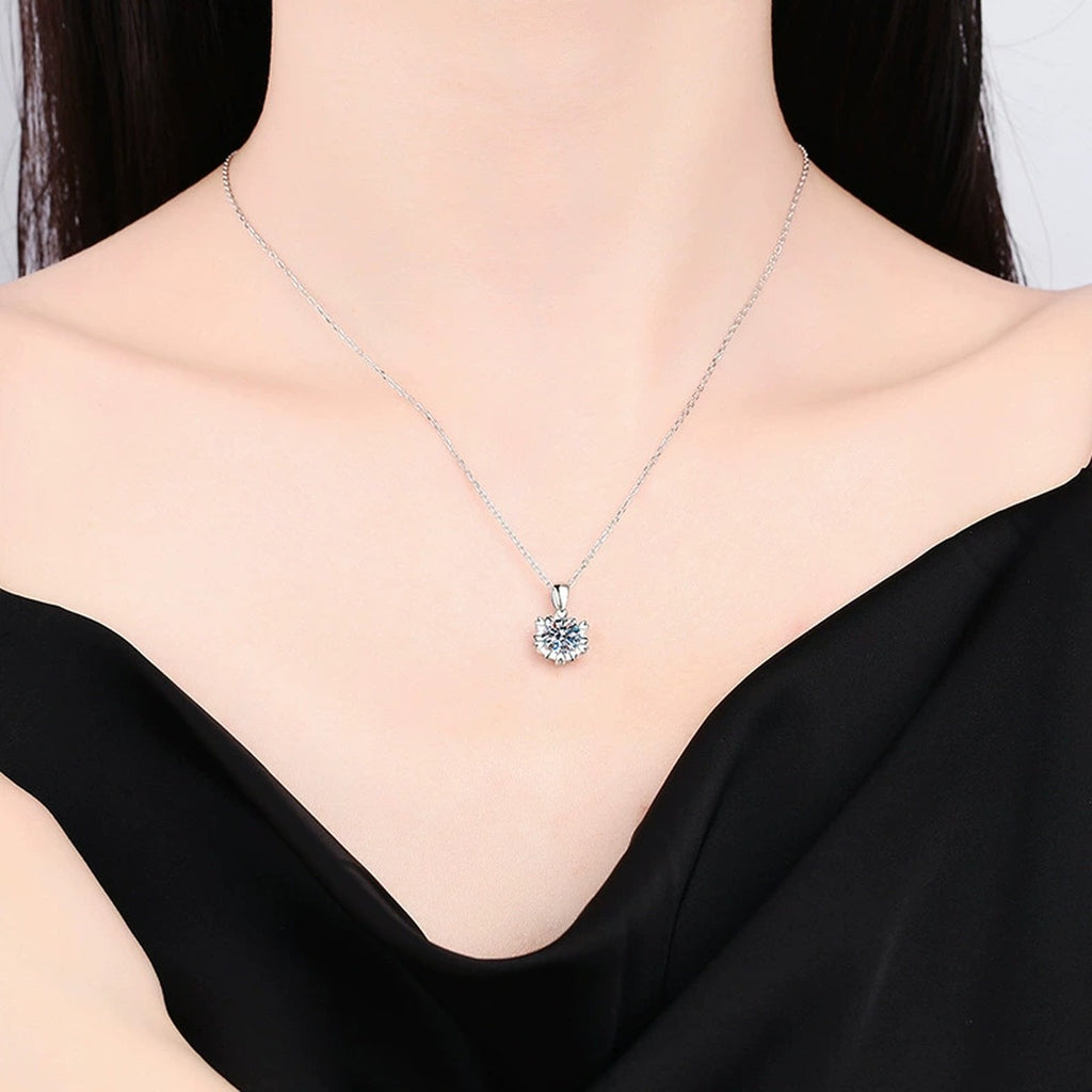 Sunburst Round Moissanite Pendant Necklace in Platinum-Plated S925 Sterling Silver worn by model at neckline