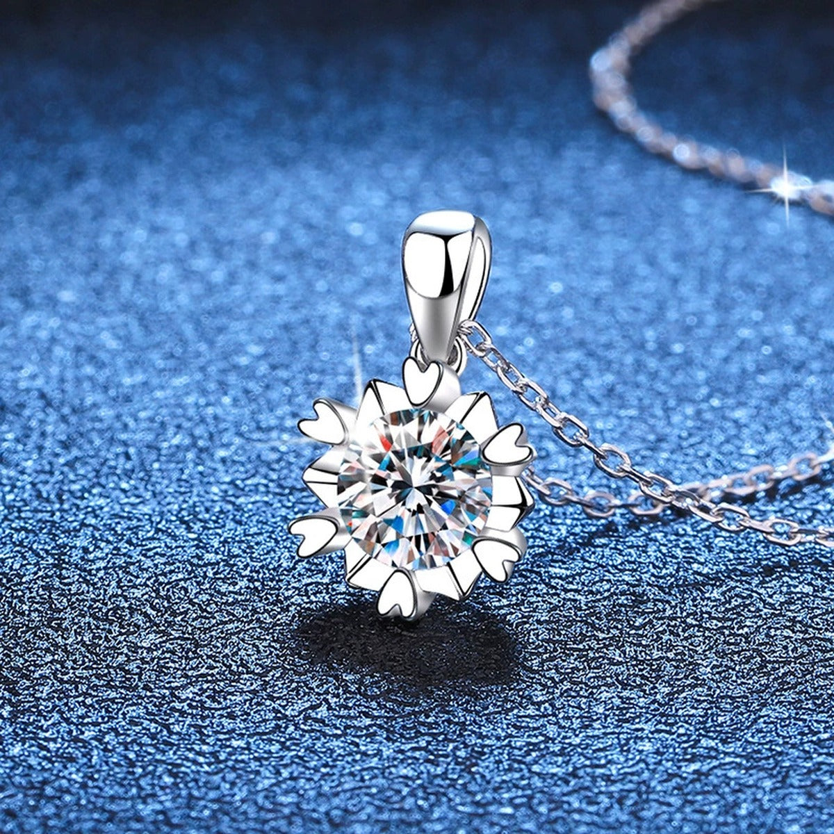 Sunburst Round Moissanite Pendant Necklace in Platinum-Plated S925 Sterling Silver blue background close-up view