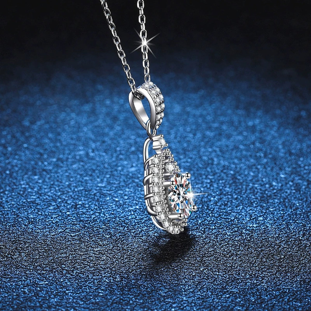 Pear Halo Moissanite Drop Necklace in Platinum-Plated S925 Sterling Silver blue background product view