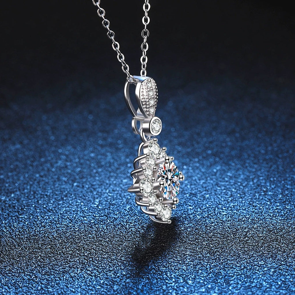 Star Halo Moissanite Pendant Necklace in Platinum-Plated S925 Sterling Silver blue background angled detail view