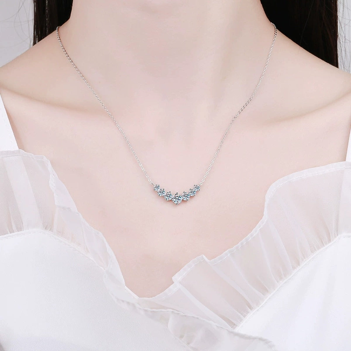 Graduated Moissanite Collar Necklace in Platinum-Plated S925 Sterling Silver worn on neckline by model