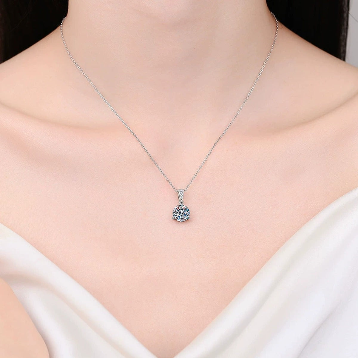 Round Moissanite Pendant Necklace in Platinum-Plated S925 Sterling Silver worn by model at neckline
