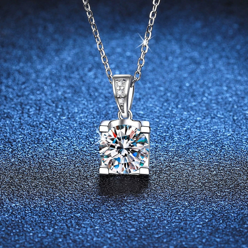 Basket-Set Round Moissanite Pendant Necklace in Platinum-Plated S925 Sterling Silver blue background product view