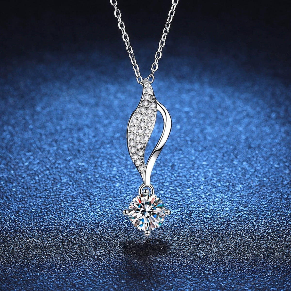 Curved Leaf Moissanite Drop Necklace in Platinum-Plated S925 Sterling Silver blue background product view
