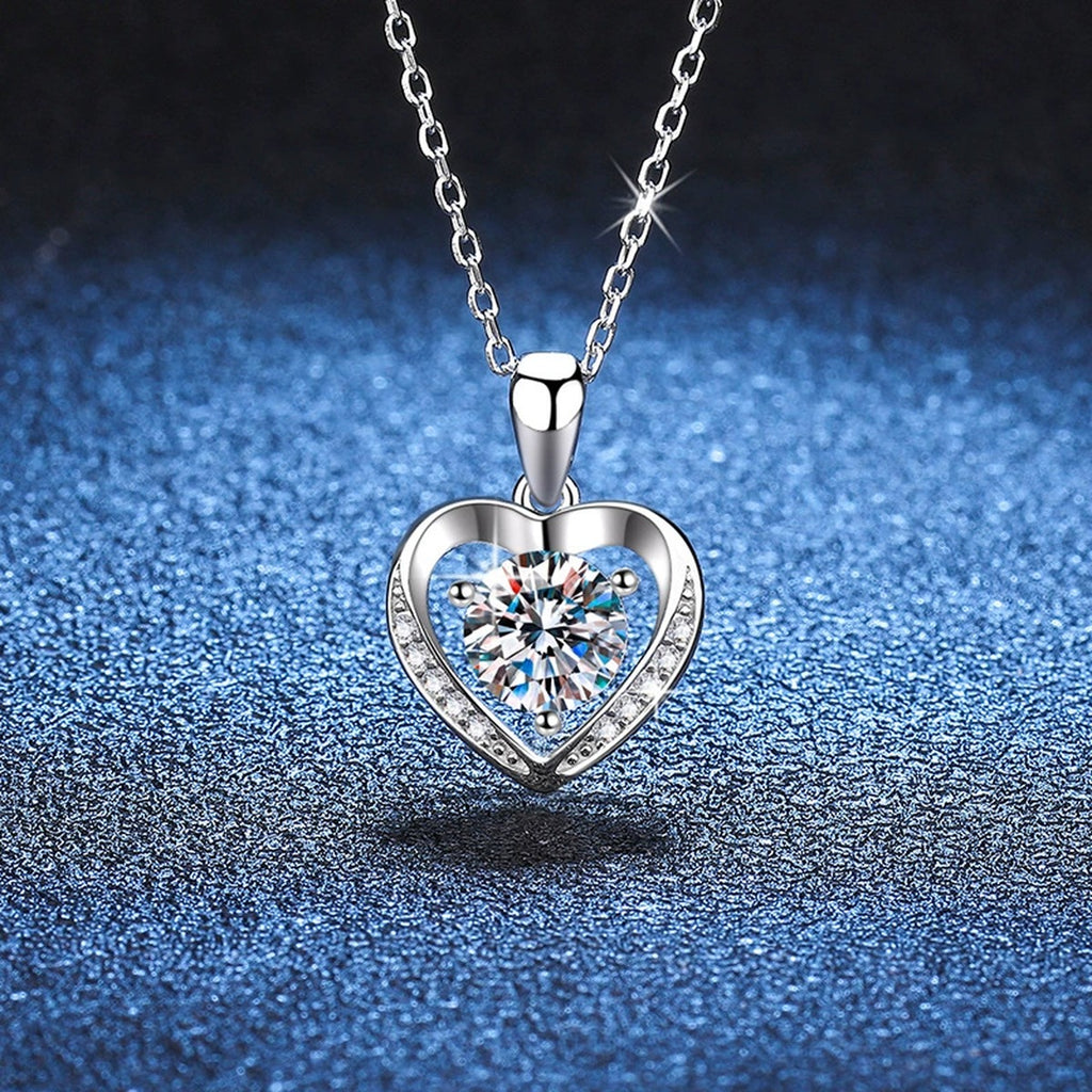 Heart Halo Moissanite Pendant Necklace in Platinum-Plated S925 Sterling Silver blue background angled detail view
