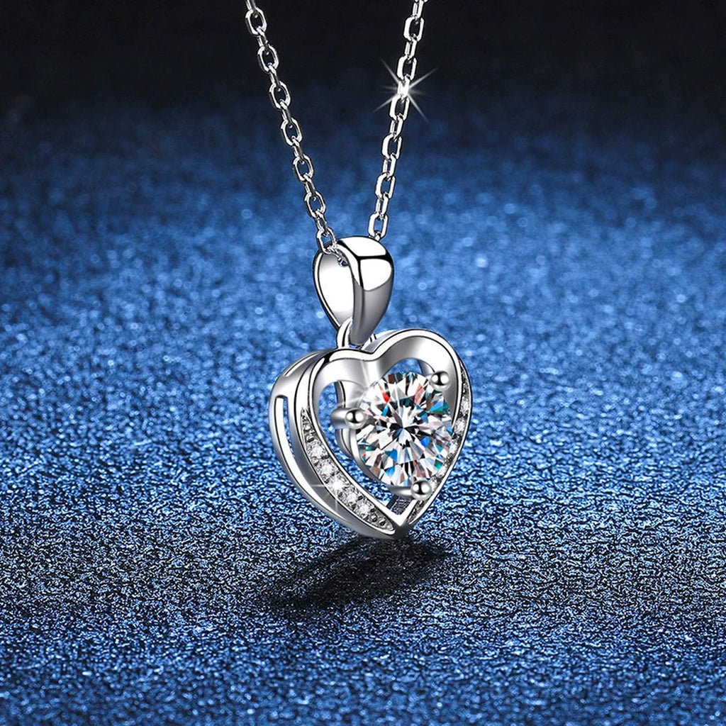 Heart Halo Moissanite Pendant Necklace in Platinum-Plated S925 Sterling Silver blue background close-up view