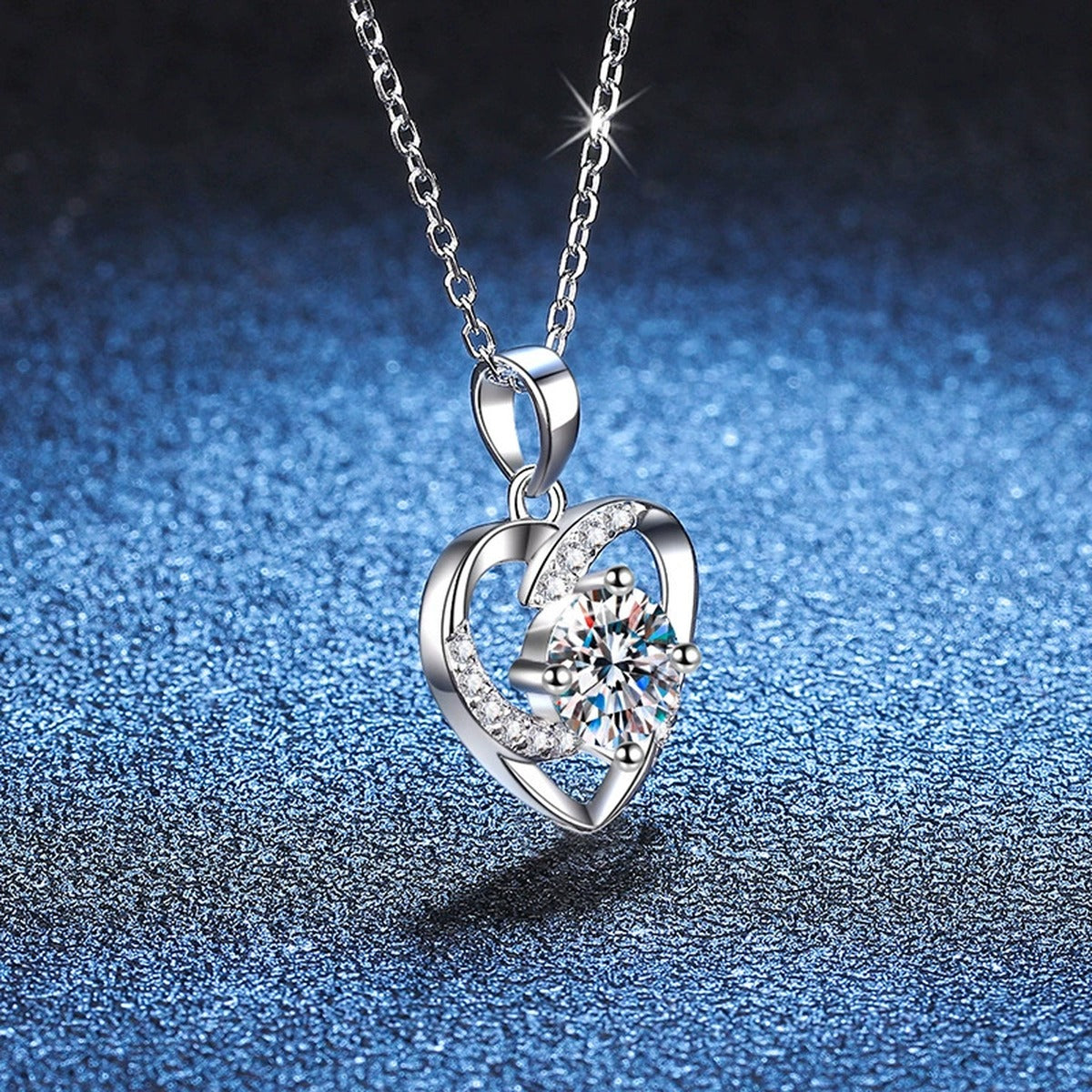 Heart Halo Moissanite Pendant Necklace in Platinum-Plated S925 Sterling Silver blue background styling view