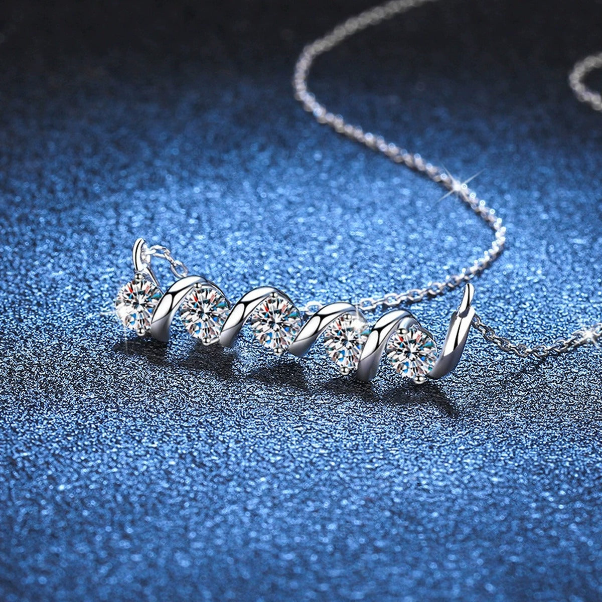 Graduated Five-Stone Moissanite Station Necklace in Platinum-Plated S925 Sterling Silver blue background product view