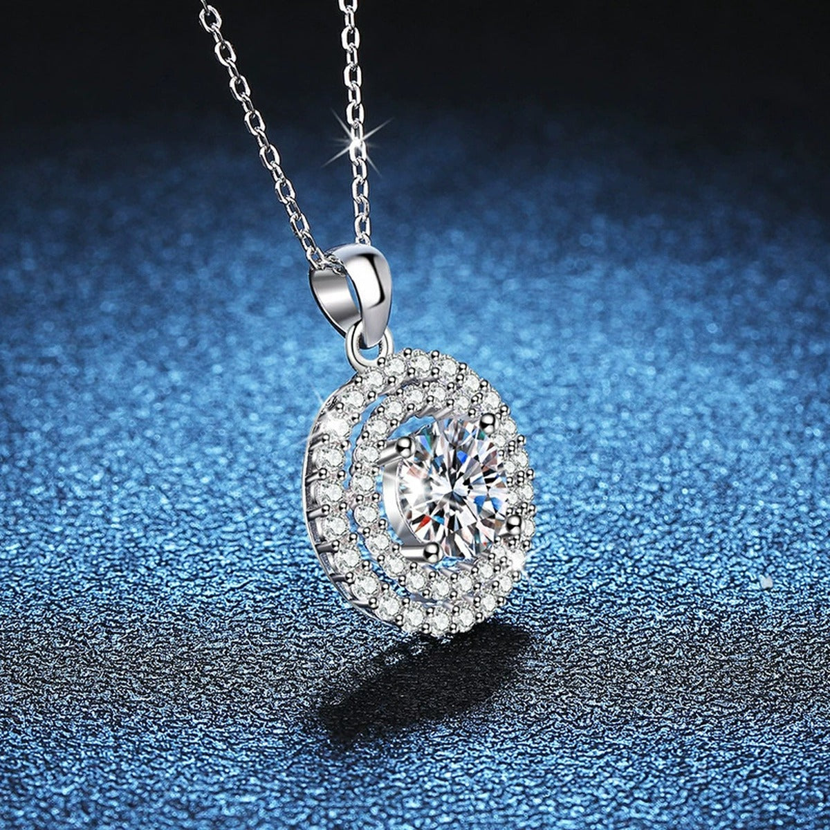 Double Halo Round Moissanite Pendant Necklace in Platinum-Plated S925 Sterling Silver blue background product view