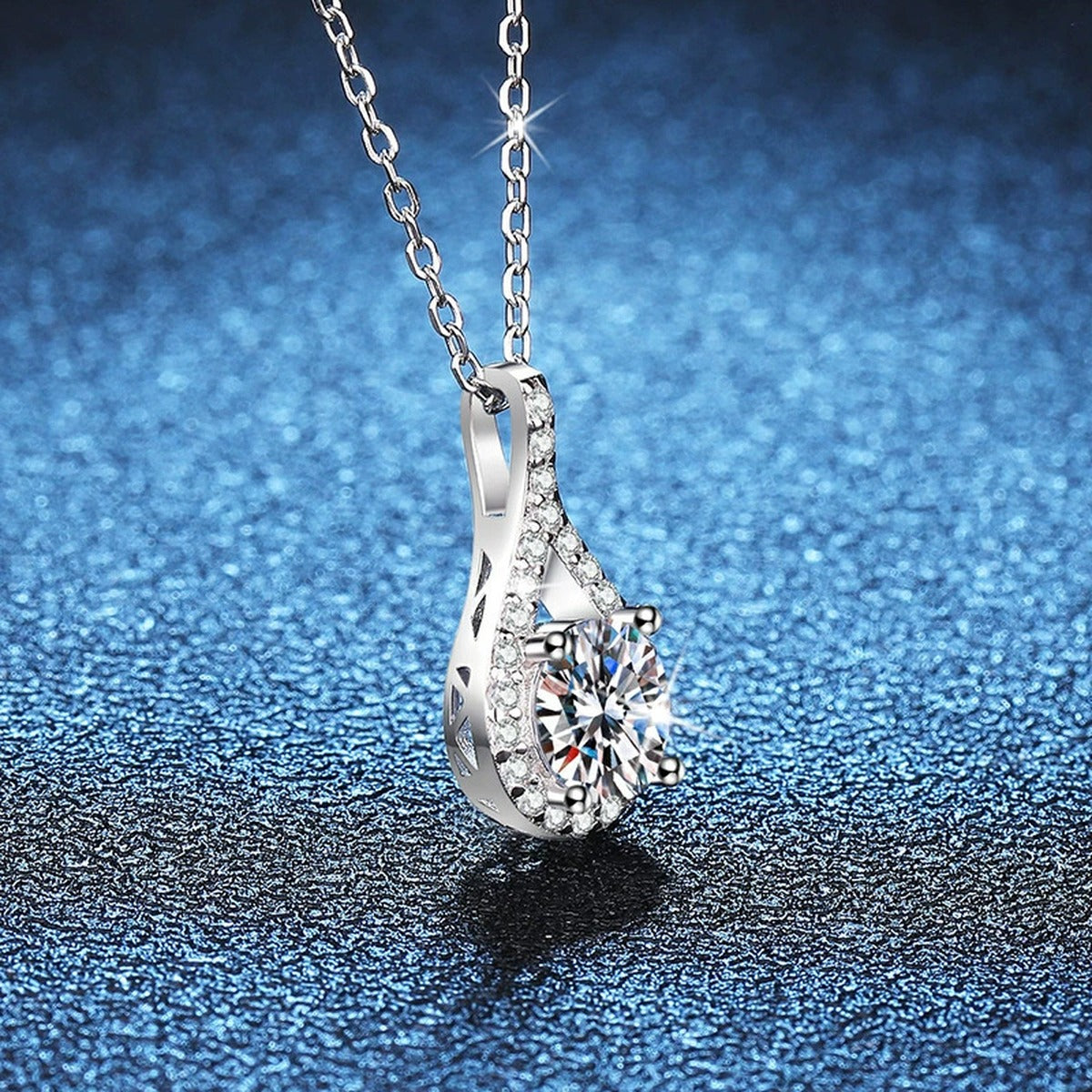 Pear Halo Moissanite Pendant Necklace in Platinum-Plated S925 Sterling Silver blue background product view