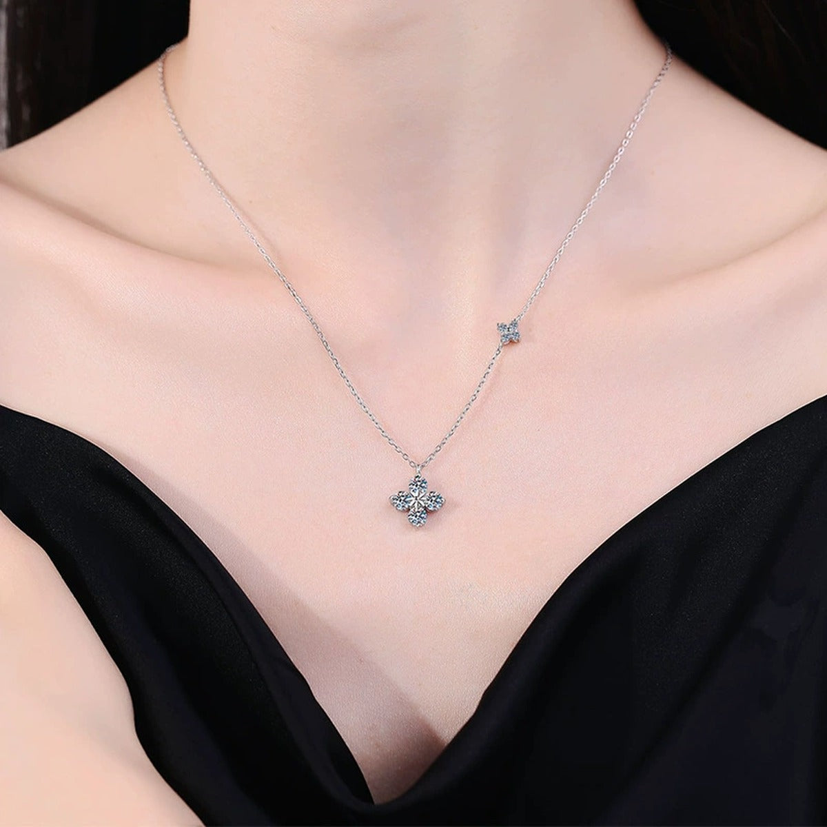 Four-Stone Clover Moissanite Pendant Necklace in S925 Sterling Silver worn on neckline by model