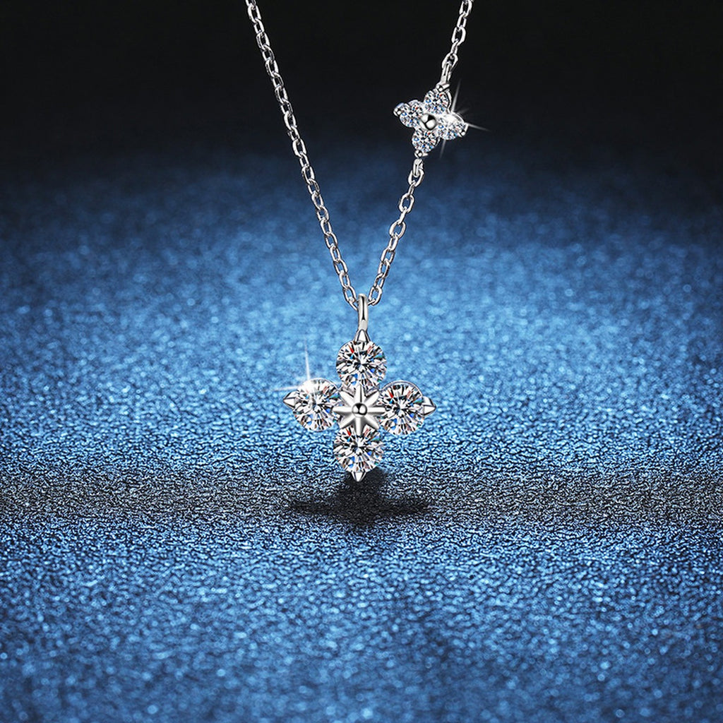 Four-Stone Clover Moissanite Pendant Necklace in S925 Sterling Silver blue background close-up view