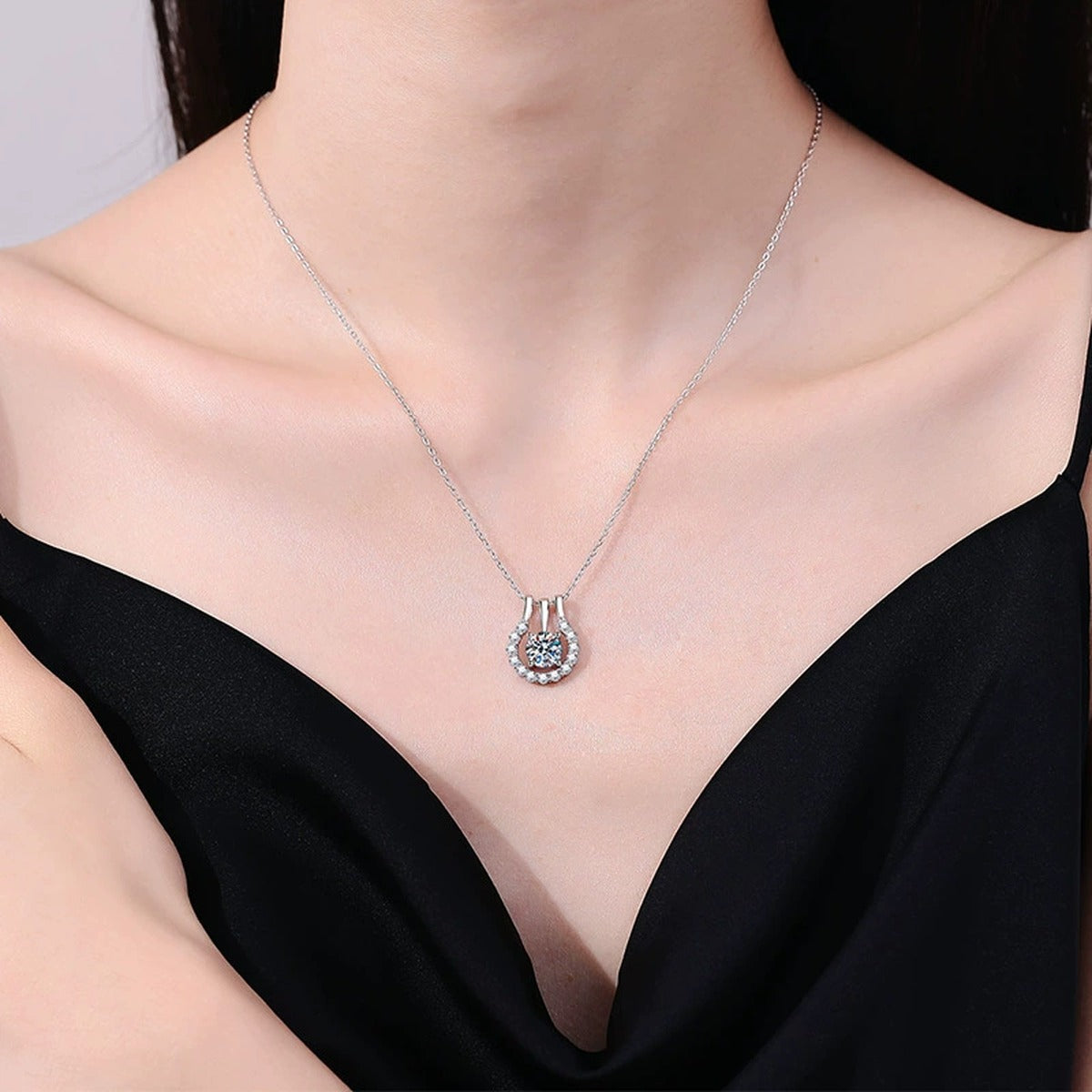 Horseshoe Halo Moissanite Pendant Necklace in Platinum-Plated S925 Sterling Silver worn on neckline by model