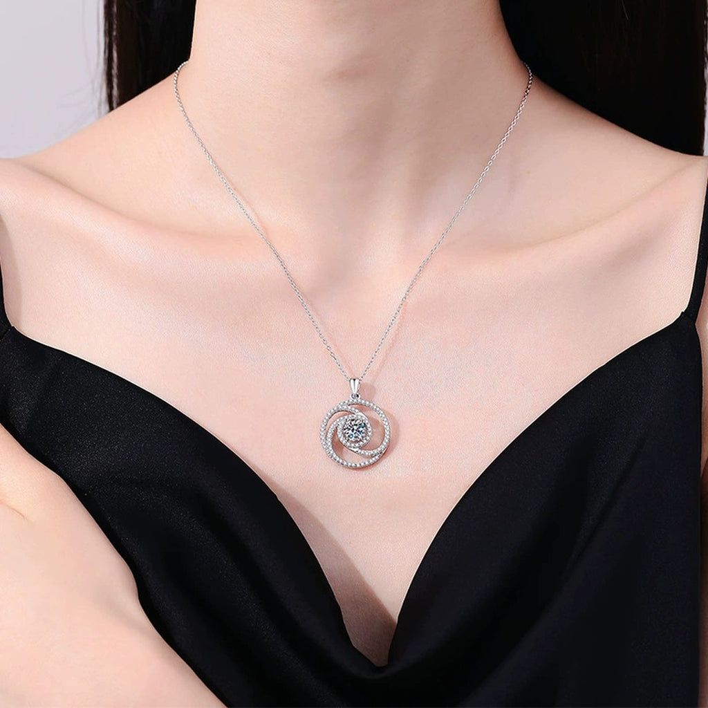Spiral Halo Moissanite Pendant Necklace in Platinum-Plated S925 Sterling Silver worn on neckline by model