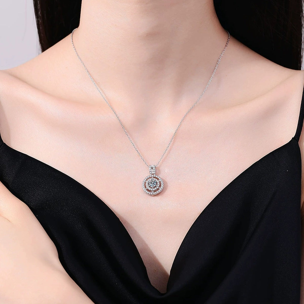 Concentric Halo Moissanite Pendant Necklace in Platinum-Plated S925 Sterling Silver worn on neckline by model