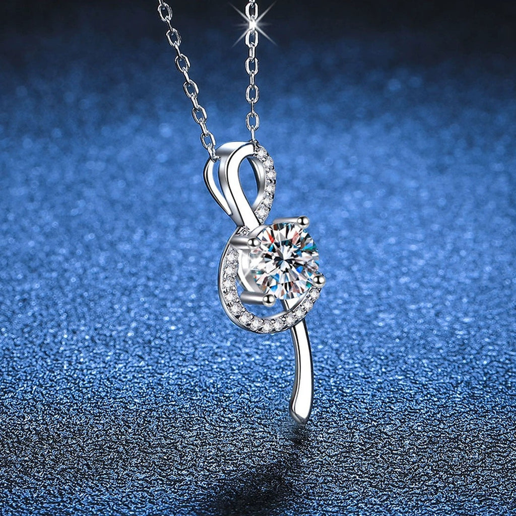 Crescent Moissanite Pendant Necklace in Platinum-Plated S925 Sterling Silver blue background product view