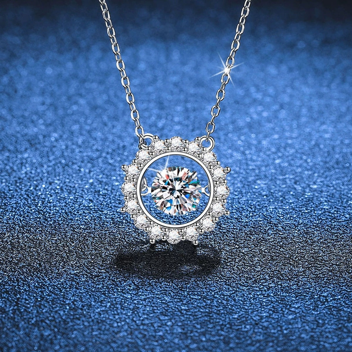 Round Halo Moissanite Pendant Necklace in Platinum-Plated S925 Sterling Silver blue background angled view