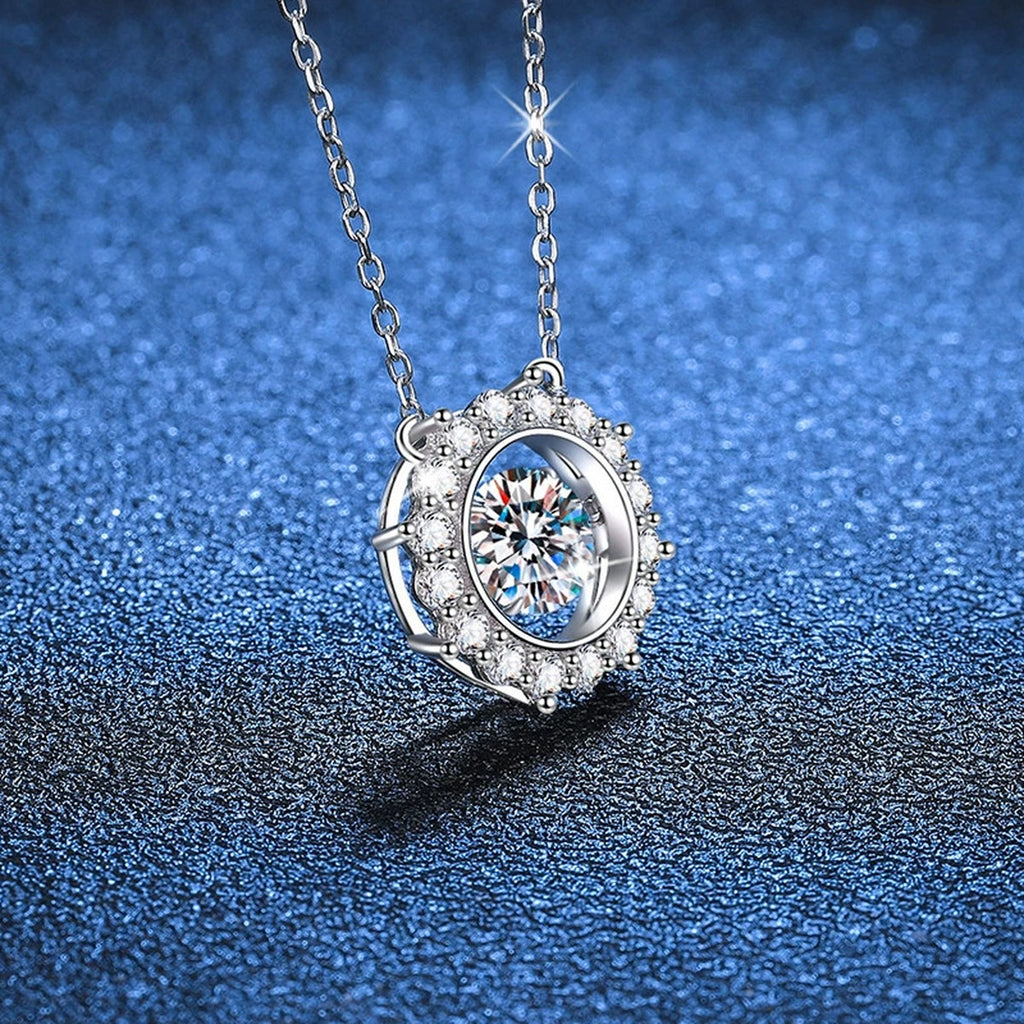 Round Halo Moissanite Pendant Necklace in Platinum-Plated S925 Sterling Silver blue background close-up view