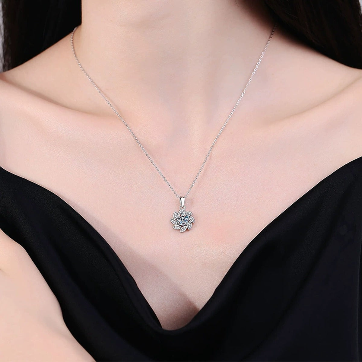Floral Swirl Moissanite Pendant Necklace in Platinum-Plated S925 Sterling Silver worn on neckline by model