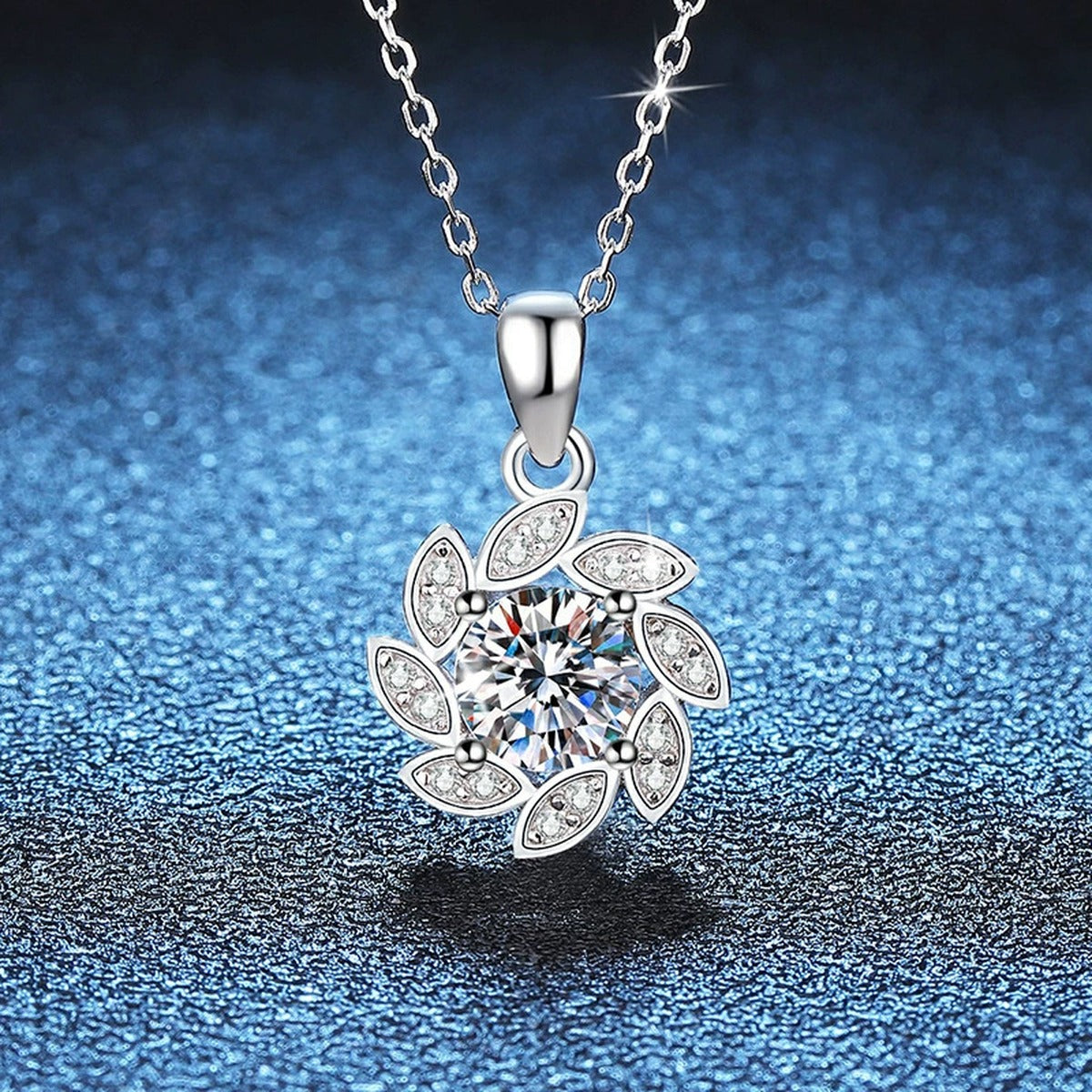 Floral Swirl Moissanite Pendant Necklace in Platinum-Plated S925 Sterling Silver blue background close-up view