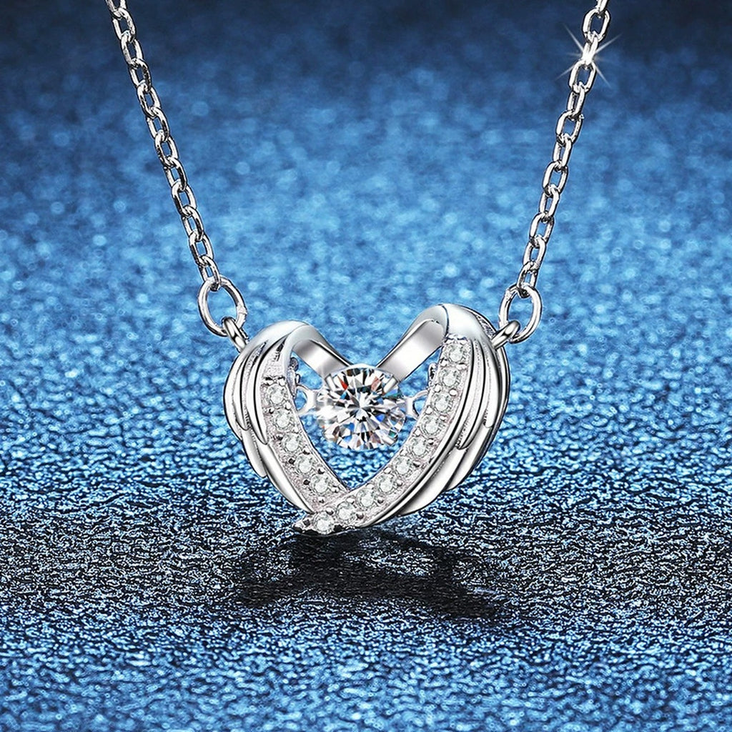 Ribbon Heart Moissanite Pendant Necklace in Platinum-Plated S925 Sterling Silver blue background angled view