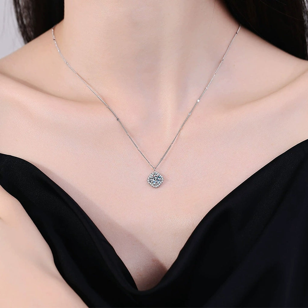 Cushion Halo Moissanite Pendant Necklace in Platinum-Plated S925 Sterling Silver worn on neckline by model