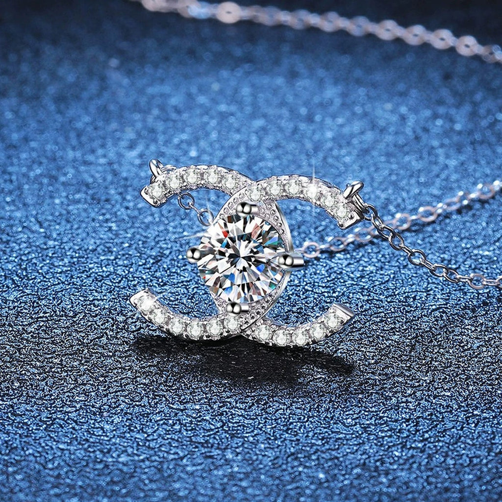 Interlocking C Moissanite Pendant Necklace in Platinum-Plated S925 Sterling Silver blue background product view