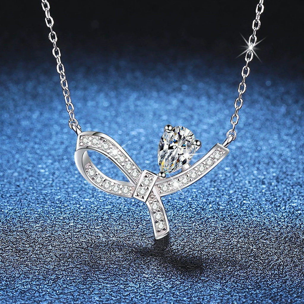 Pear-Cut Moissanite Ribbon Necklace in Platinum-Plated S925 Sterling Silver blue background product view