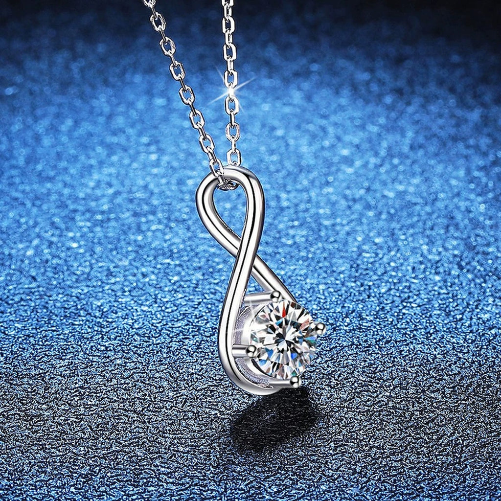 Teardrop Moissanite Pendant Necklace in Platinum-Plated S925 Sterling Silver blue background product view