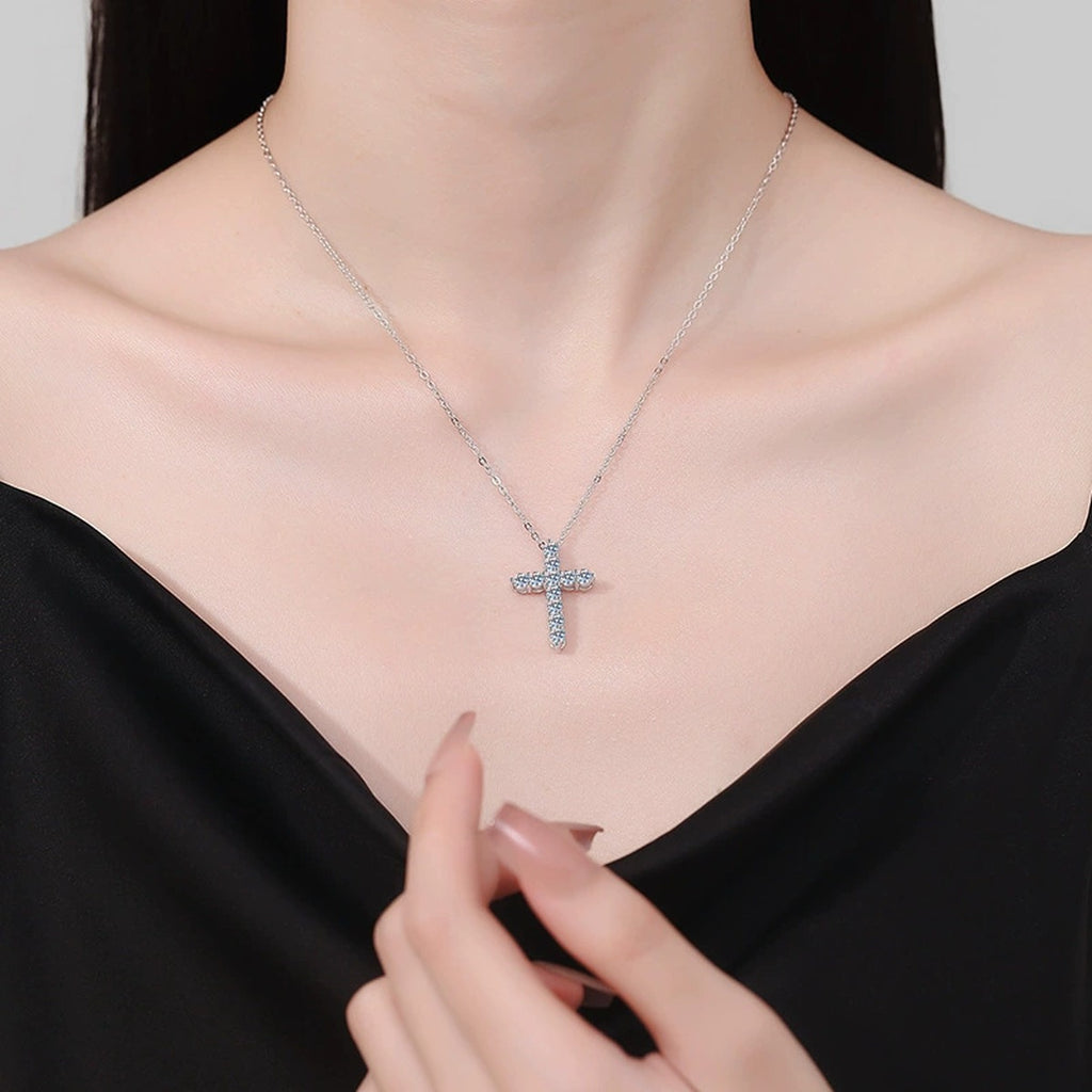 Cross Moissanite Pendant Necklace in White Gold-Plated S925 Sterling Silver worn on neckline by model