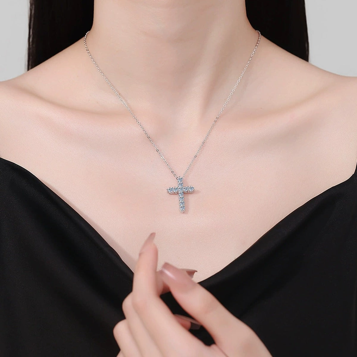 Cross Moissanite Pendant Necklace in White Gold-Plated S925 Sterling Silver worn on neckline by model