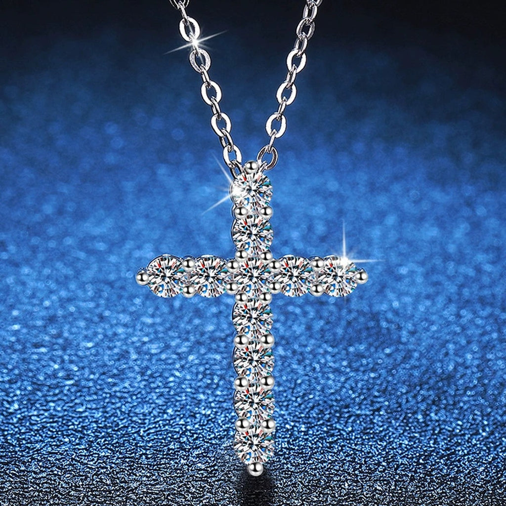 Cross Moissanite Pendant Necklace in White Gold-Plated S925 Sterling Silver blue background angled view