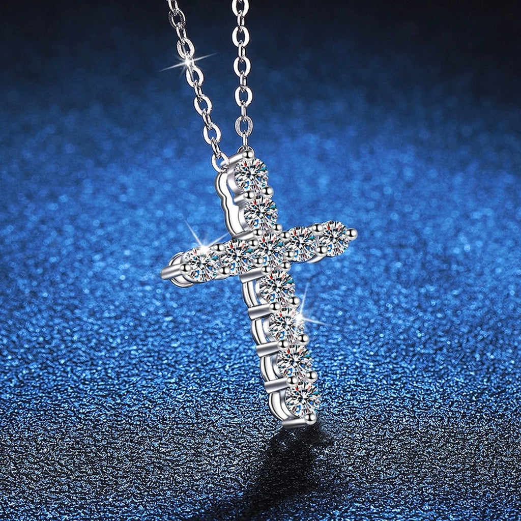 Cross Moissanite Pendant Necklace in White Gold-Plated S925 Sterling Silver blue background close-up view