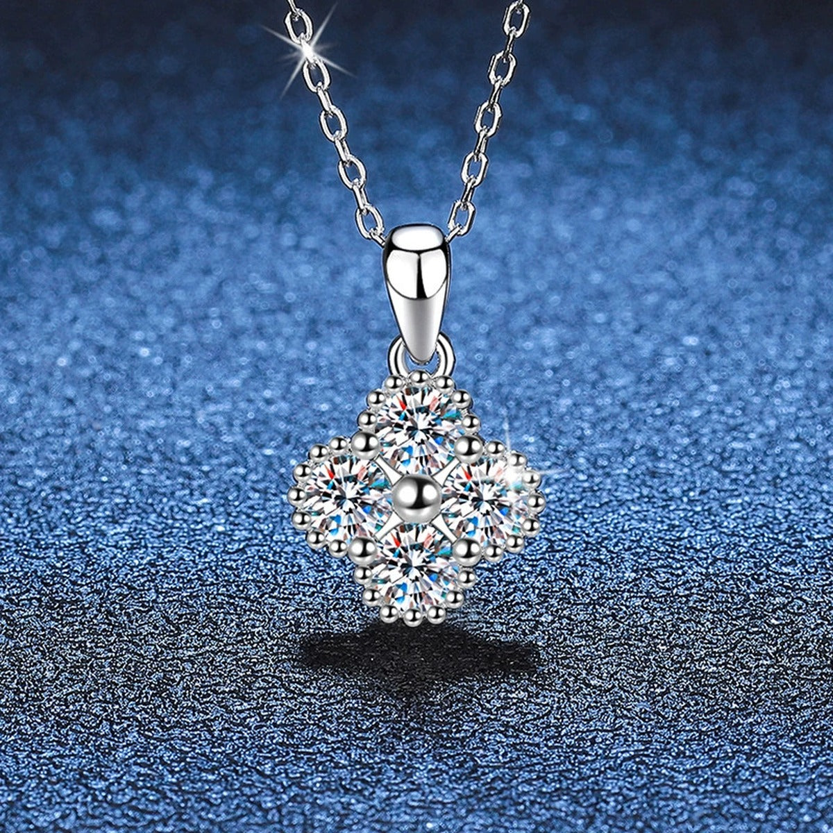 Four-Stone Cluster Moissanite Pendant Necklace in Platinum-Plated S925 Sterling Silver blue background product view