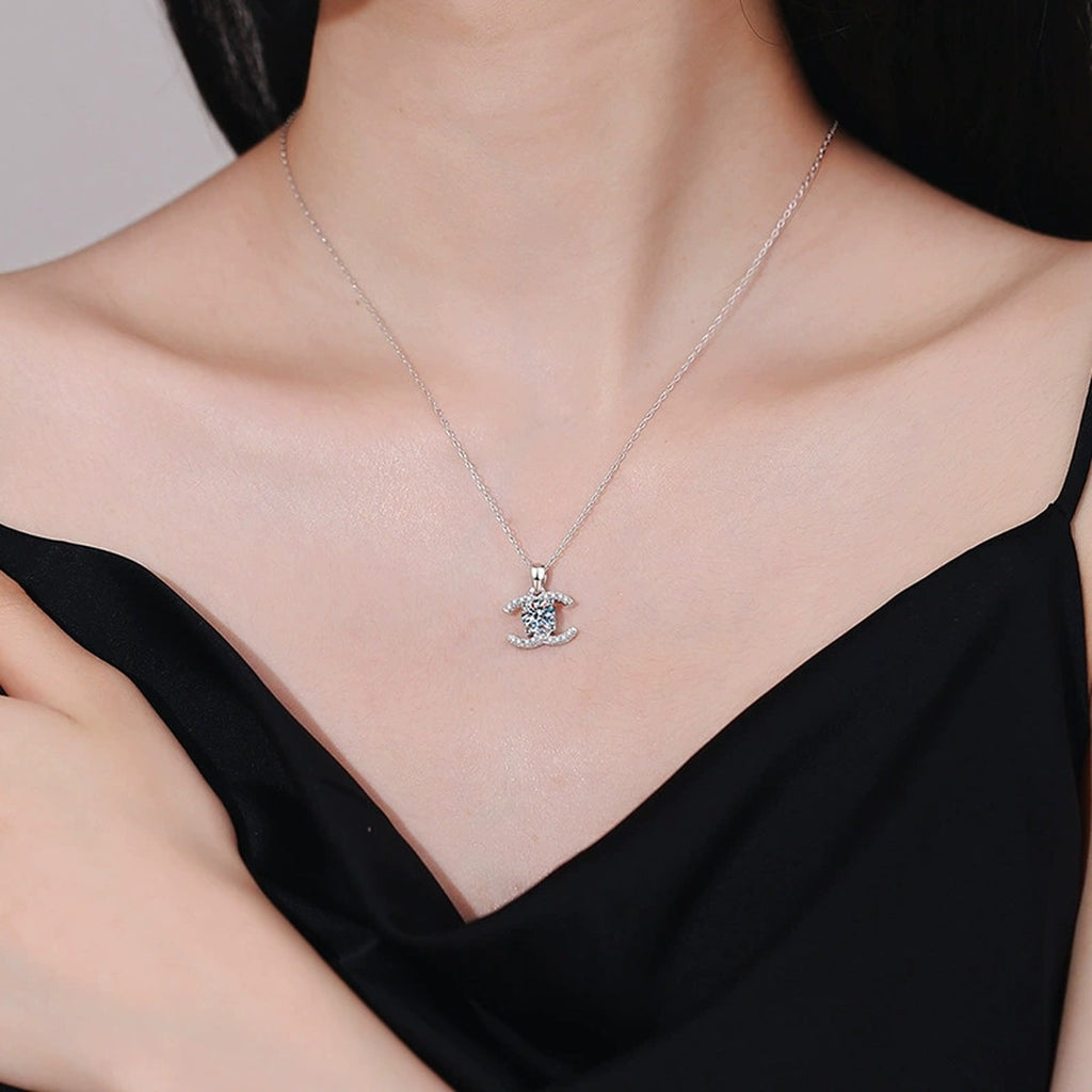 Crescent Halo Moissanite Pendant Necklace in White Gold-Plated and Yellow Gold-Plated S925 Sterling Silver worn on neckline by model