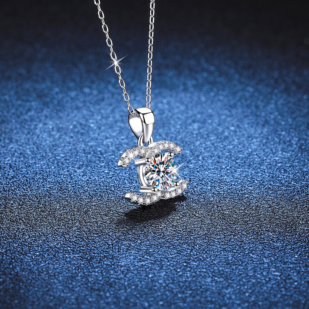 Crescent Halo Moissanite Pendant Necklace in White Gold-Plated and Yellow Gold-Plated S925 Sterling Silver blue background product view