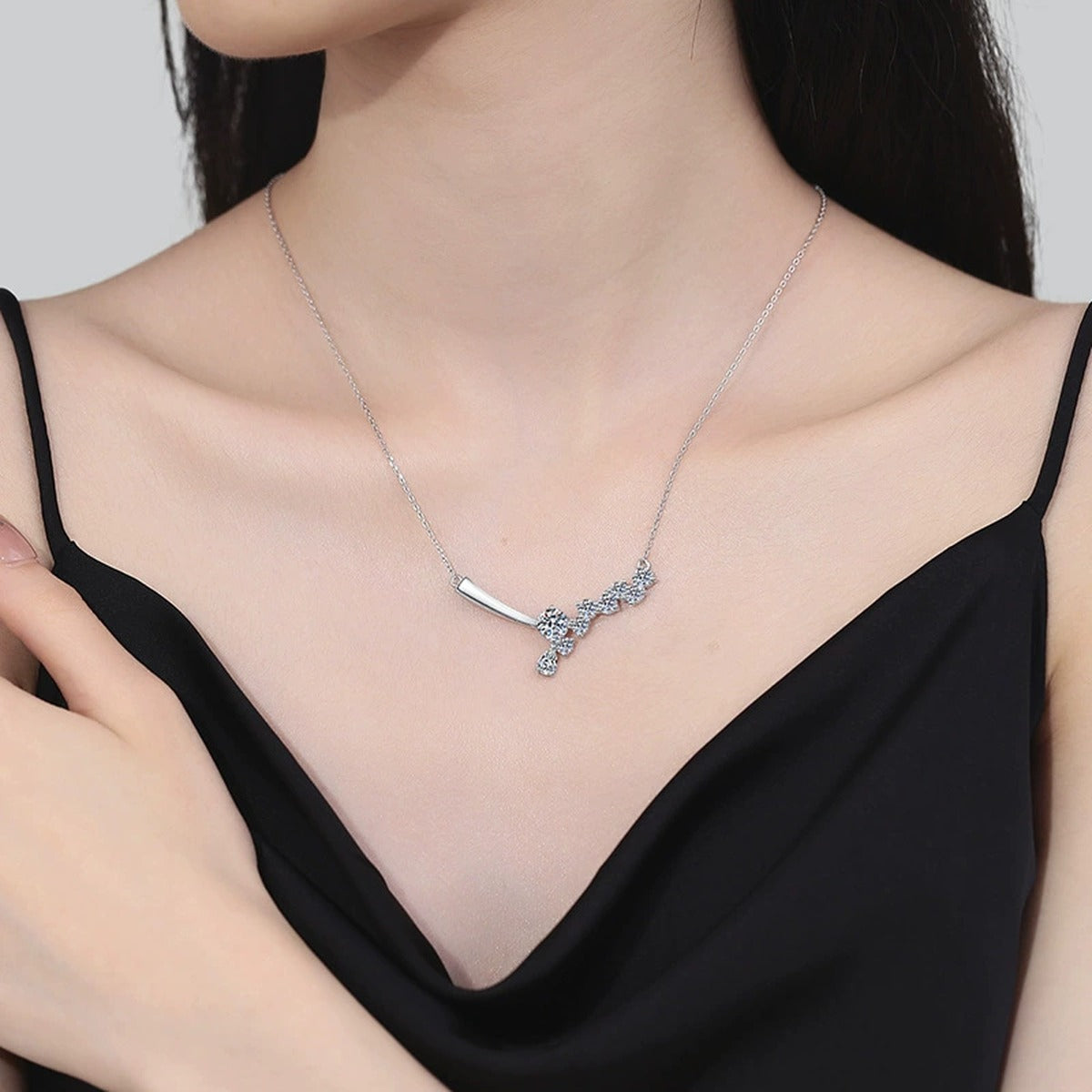 Graduated Moissanite Collar Necklace in Platinum-Plated S925 Sterling Silver worn on neckline by model
