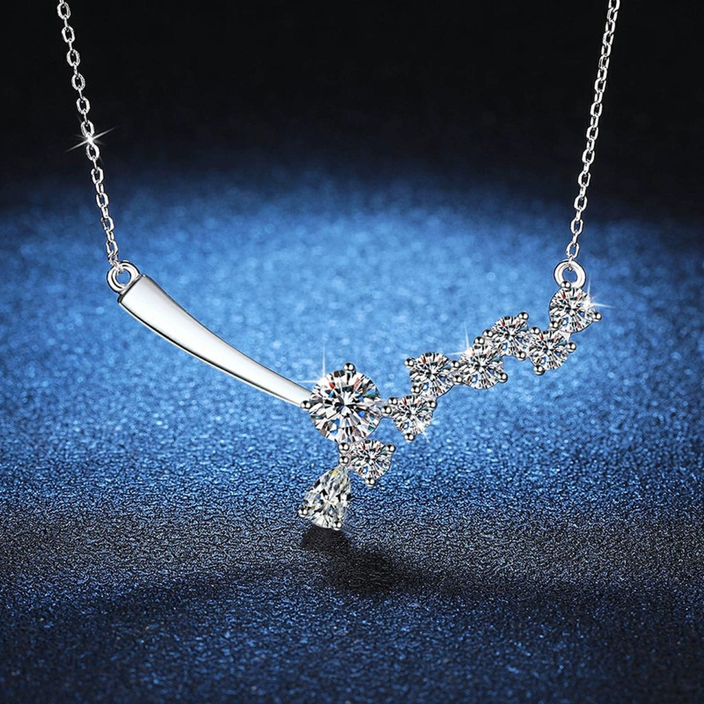 Graduated Moissanite Collar Necklace in Platinum-Plated S925 Sterling Silver blue background angled view