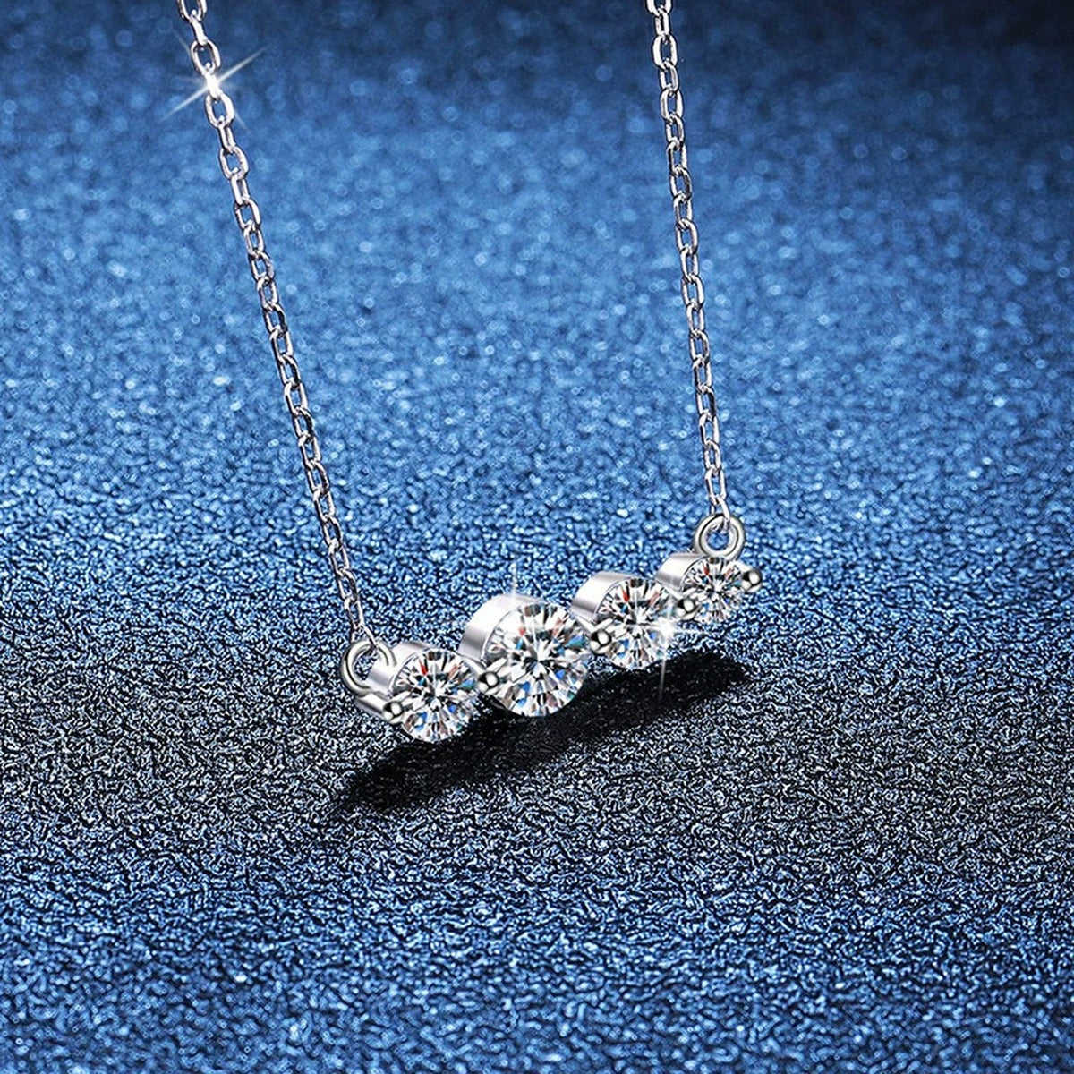 Four-Stone Moissanite Station Necklace in Platinum-Plated S925 Sterling Silver blue background product view