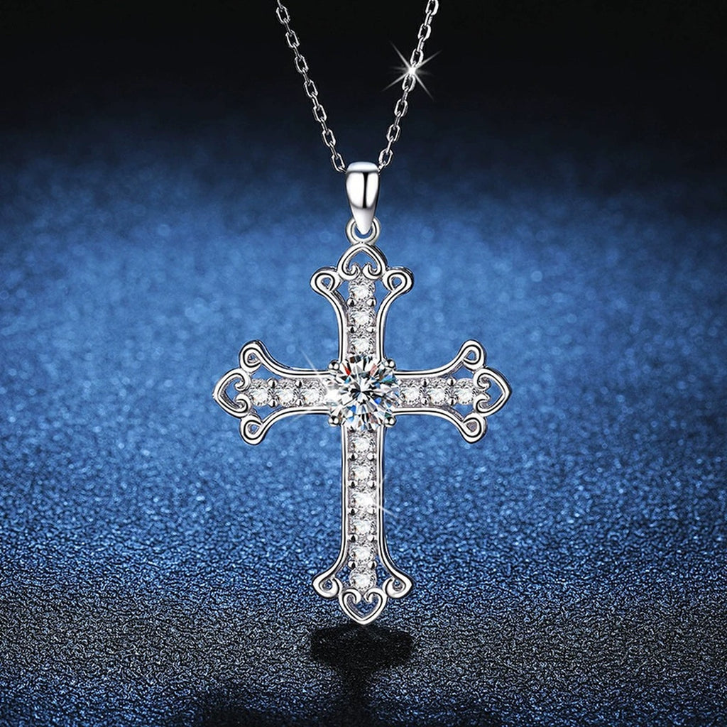Cross Moissanite Pendant Necklace in Platinum-Plated S925 Sterling Silver blue background angled view