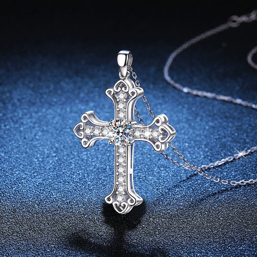 Cross Moissanite Pendant Necklace in Platinum-Plated S925 Sterling Silver blue background close-up view