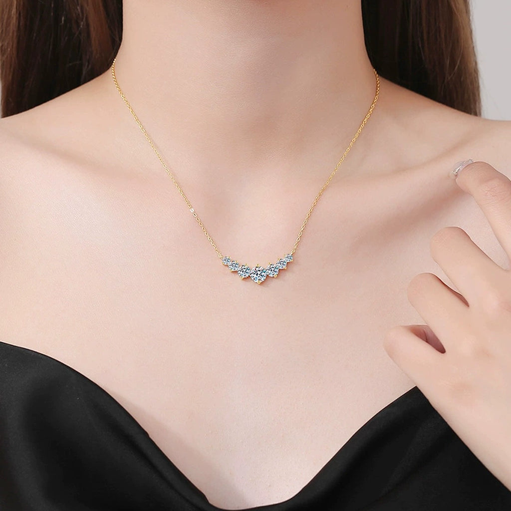 Graduated Moissanite Collar Necklace in Yellow Gold-Plated S925 Sterling Silver worn on neckline by model