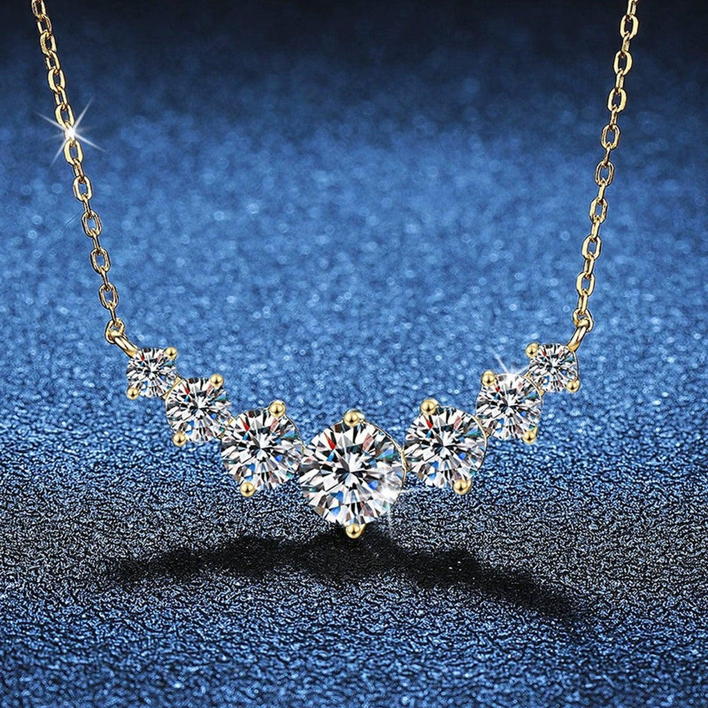 Graduated Moissanite Collar Necklace in Yellow Gold-Plated S925 Sterling Silver blue background angled view