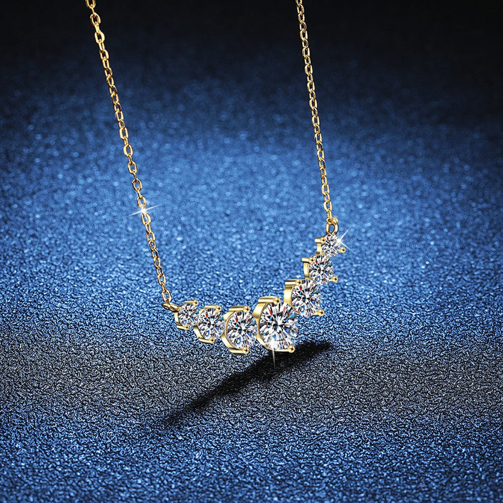 Graduated Moissanite Collar Necklace in Yellow Gold-Plated S925 Sterling Silver blue background close-up view