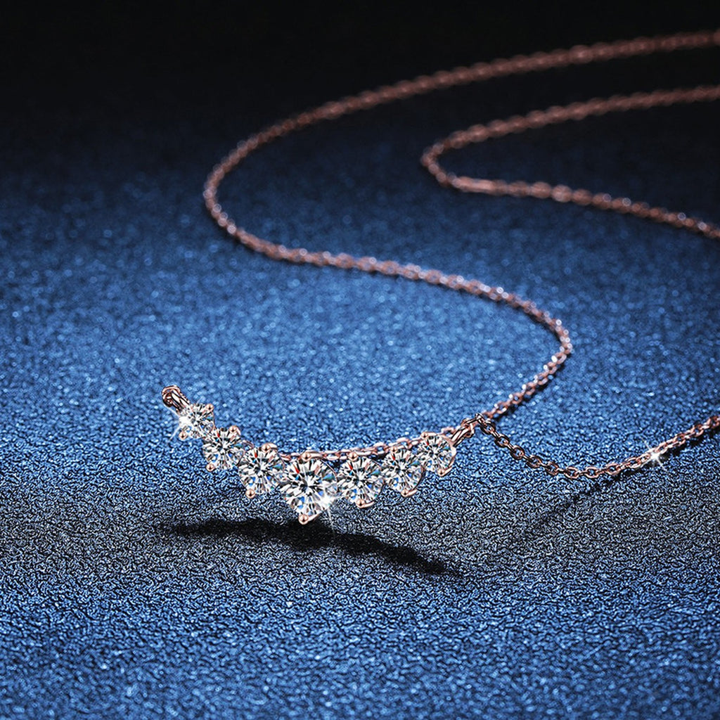 Graduated Moissanite Collar Necklace in Rose Gold-Plated S925 Sterling Silver blue background close-up view
