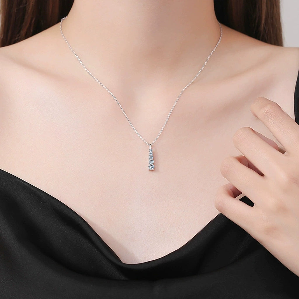 Tapered Bar Moissanite Pendant Necklace in Platinum-Plated S925 Sterling Silver worn on neckline by model