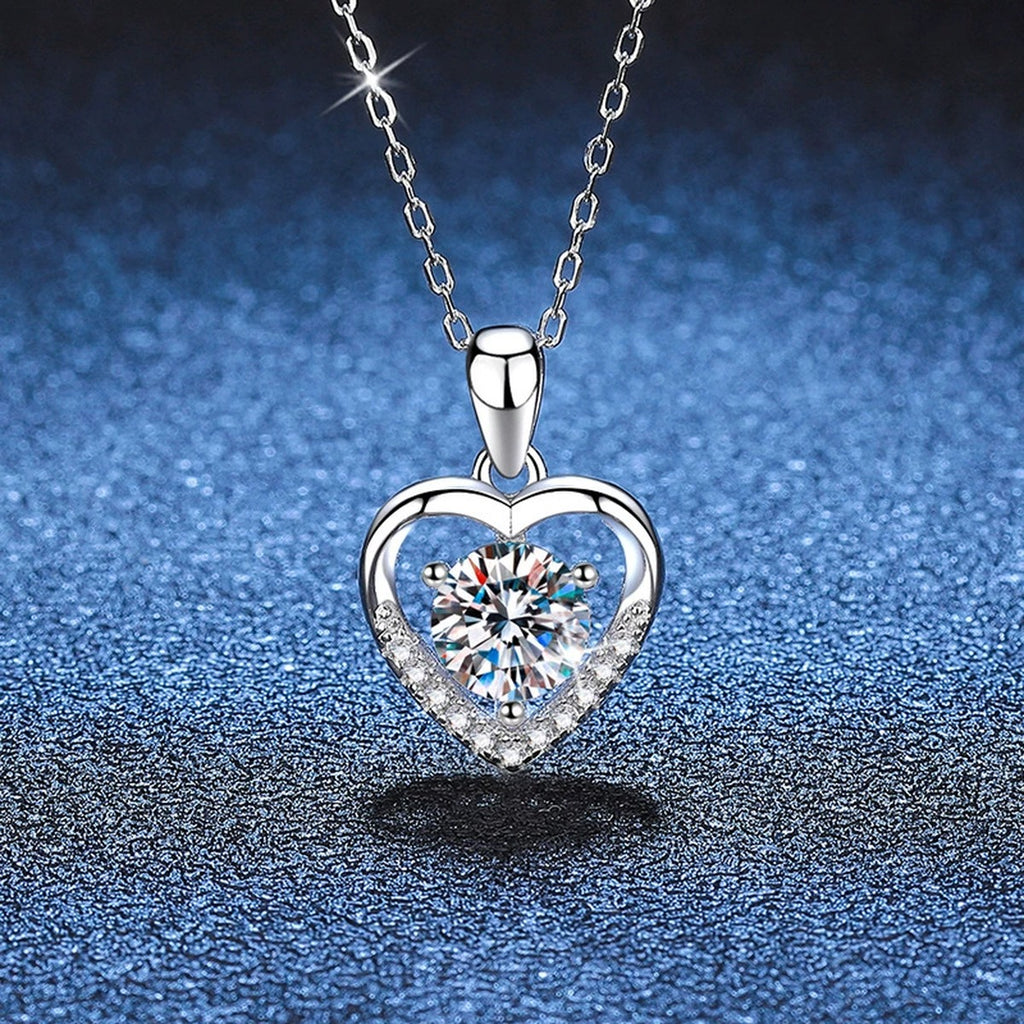 Heart Halo Moissanite Pendant Necklace in Platinum-Plated S925 Sterling Silver blue background angled view