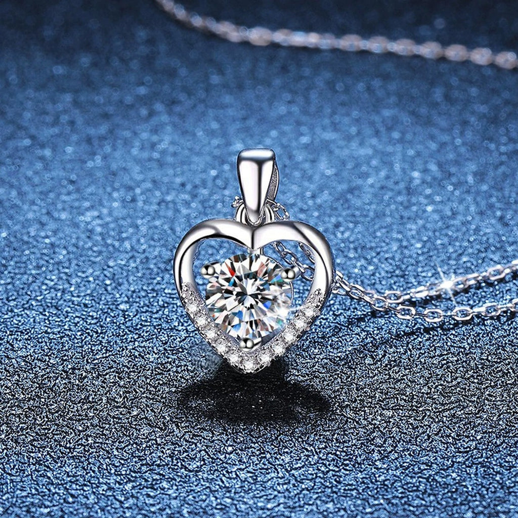 Heart Halo Moissanite Pendant Necklace in Platinum-Plated S925 Sterling Silver blue background close-up view