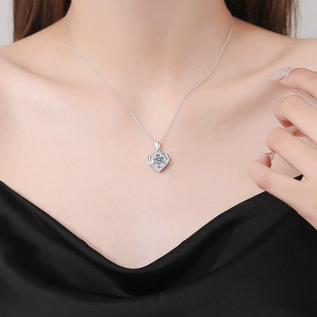 Open Heart Halo Moissanite Pendant Necklace in Platinum-Plated S925 Sterling Silver worn on neckline by model