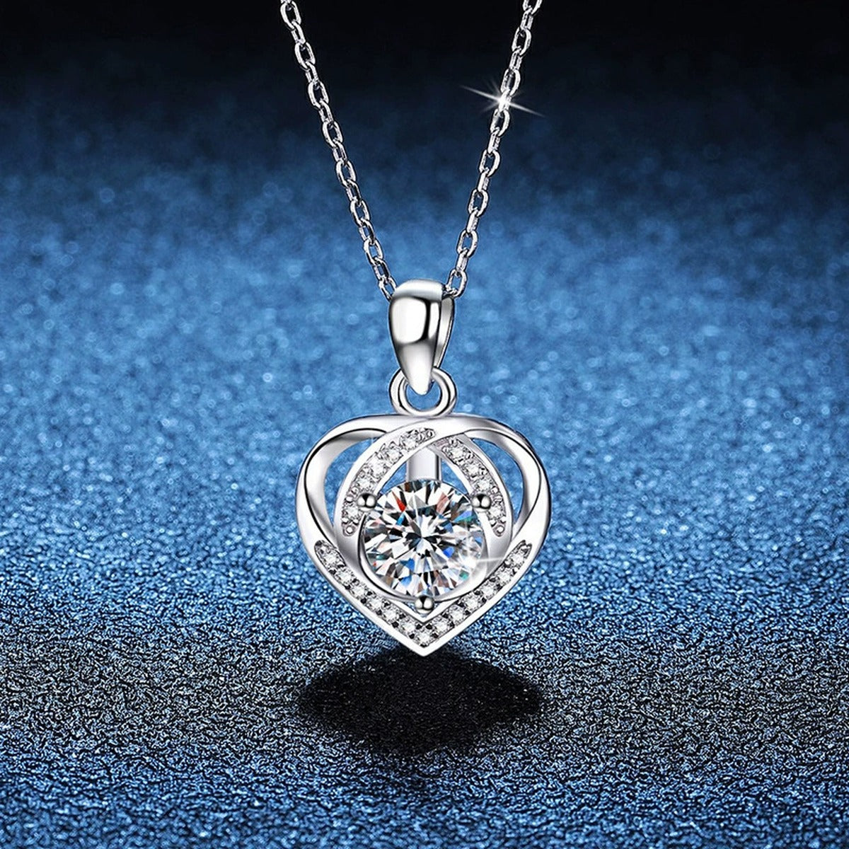 Open Heart Halo Moissanite Pendant Necklace in Platinum-Plated S925 Sterling Silver blue background angled view